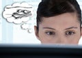 Close up of woman at computer dreaming of holiday against blurry window Royalty Free Stock Photo