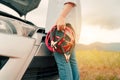 Close up Woman connecting battery cable copper wire for jumper repair and maintenance