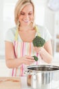 Close up of a woman cooking broccoli Royalty Free Stock Photo