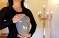 Close up of woman with cremation urn in church Royalty Free Stock Photo