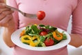 Close Up Of Woman Eating Healthy Salad