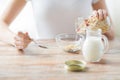 Close up of woman eating muesli for breakfast Royalty Free Stock Photo