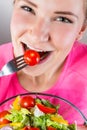 Close up of woman eating salad Royalty Free Stock Photo