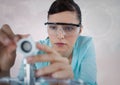 Close up of woman with electronics against white background with interface Royalty Free Stock Photo