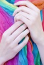 Close up of woman elegant thin hands long fingers holding scarf