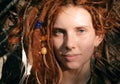 Close up Woman Face with Dreadlocks and Piercing