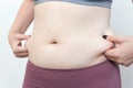 Close up of woman fat belly waist, love handles