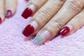 Woman fingernail painting dark red color gel nail art,polish apply after one month