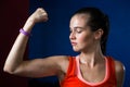Close-up of woman flexing muscles in gym Royalty Free Stock Photo