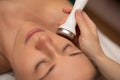 Close-up Of Woman Getting Facial Hydro Microdermabrasion Peeling Treatment At Cosmetic Beauty Spa Clinic. Face Skin Care. Hydra