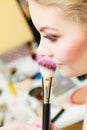 Close up woman getting make up, blush Royalty Free Stock Photo