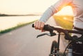 Close up woman hand on the bicycle handlebars Royalty Free Stock Photo