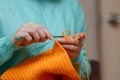 Close up of Woman Hand Crochet Woolen Sweater Royalty Free Stock Photo