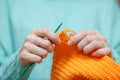 Close up of Woman Hand Crochet Woolen Sweater