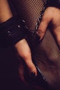 Close Up of Woman with Hand Cuffs. Concept Bondage Games