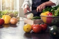 Close up of woman hand cutting onion on chopping wood board with