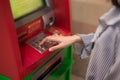 Close-up of woman hand entering PIN/pass code on ATM/bank machine keypad. Royalty Free Stock Photo