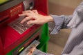 Close-up of woman hand entering PIN/pass code on ATM/bank machine keypad. Royalty Free Stock Photo