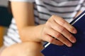 Close up woman hand holding book in hand Royalty Free Stock Photo