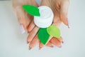Close-up of a woman hand holding a container of moisturizer cream Royalty Free Stock Photo