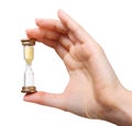 Close up of woman hand holding hourglass