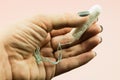 Close up of woman hand holding menstruation cotton tampon Royalty Free Stock Photo