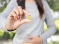 Close up of woman hand holding pills. Royalty Free Stock Photo