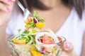 Woman hand holding salad bowl eating healthy lifestyle Royalty Free Stock Photo