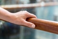 Close up of woman hand holding to railing Royalty Free Stock Photo