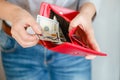 Close up woman hand holding wallet and counting money Royalty Free Stock Photo