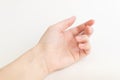 Close up woman hand with nails form of soft square holds something in fingers. Female keeps virtual object