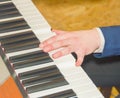 Close up of woman hand playing piano Royalty Free Stock Photo