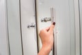 Close up woman hand pull the shower door in luxury bathroom Royalty Free Stock Photo