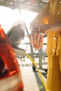 Close up of woman hands attaching power cable supply to charge electric or EV car using app on wearable smart watch Royalty Free Stock Photo