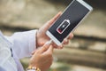 Close up a woman hands charging her mobile phone with charging icon