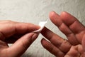 Close up of woman hands, cleaning the finger with an alcohol pad for express HIV test Royalty Free Stock Photo