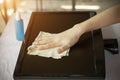 Close up of woman hands cleaning laptop screen Royalty Free Stock Photo