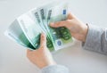 Close up of woman hands counting euro money