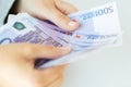 Close up of woman hands counting euro money