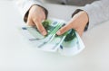 Close up of woman hands counting euro money