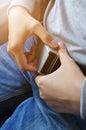 Close up of woman hands fasten belts while sitting on airplane s