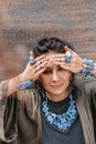 Close up of woman hands with with gem stones accessories outdoors