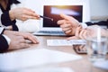 Close up of woman hands giving a pen to businessman for contract signing Royalty Free Stock Photo