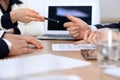 Close up of woman hands giving a pen to businessman for contract signing Royalty Free Stock Photo