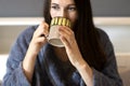 Woman hands holding big mug beverage tea or coffee cup,female drinking hot chocolate drink Royalty Free Stock Photo