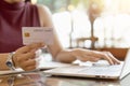 Close up woman hands holding credit card for online payment shopping Royalty Free Stock Photo