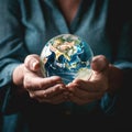 Close up woman hands holding planet Earth globe. Earth day. AI generated picture Royalty Free Stock Photo