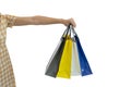 Close-up of woman hands holding shopping bags isolated on white background Royalty Free Stock Photo