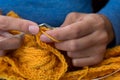 Close up of woman hands knitting colorful wool yarn Royalty Free Stock Photo