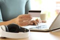 Woman hands paying music with credit card